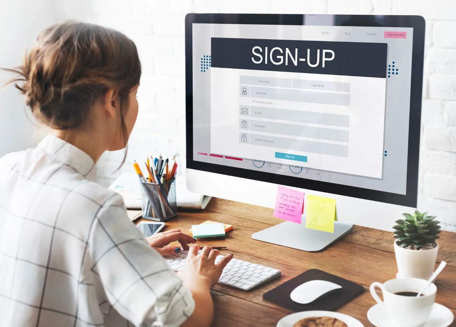 A Person Happily Signing Up For Cit Bank Online, Representing The Ease And Convenience Of The Process.